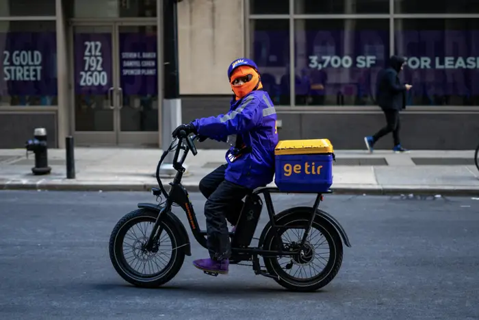 a delivery cyclist on a cold day in Manhattan